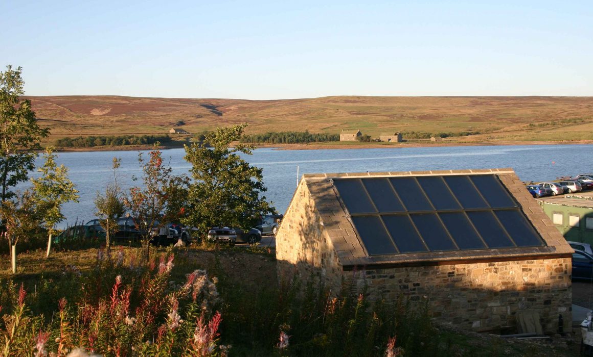 TiSUN Solar Heat Europe – TiSUN’s large flat FI collectors on Yorkshire Dales Sailing Club’s store room roof